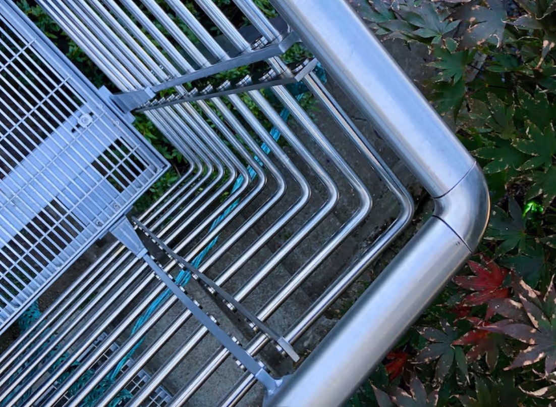 An oval tube stainless steel balcony railing measuring 47x25x2mm, with matching cast elbow connector