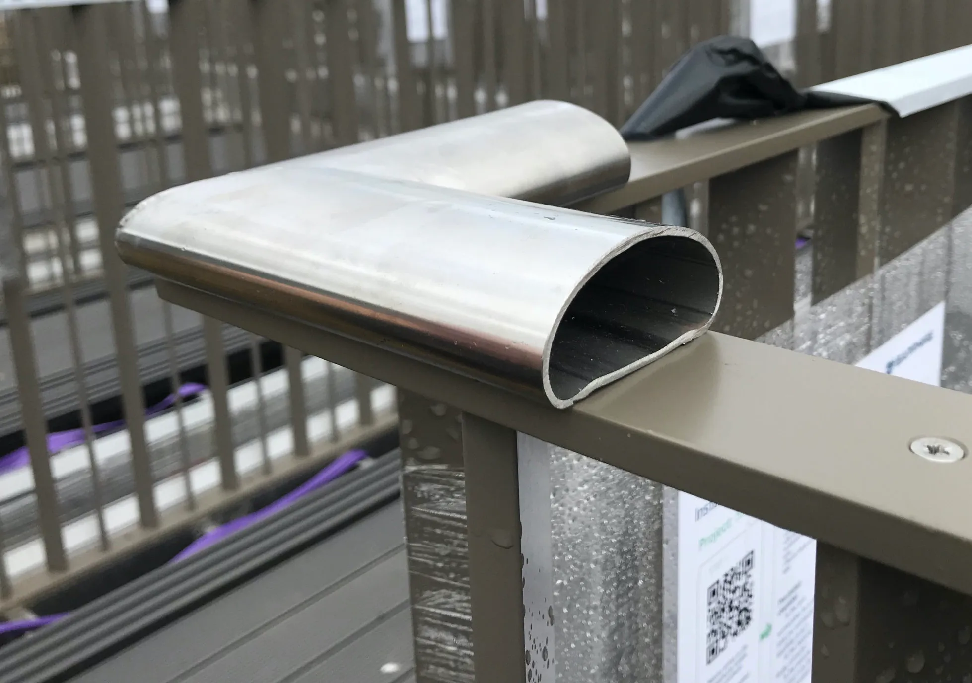 D-Shaped stainless steel tubing being used a balustrade handrail