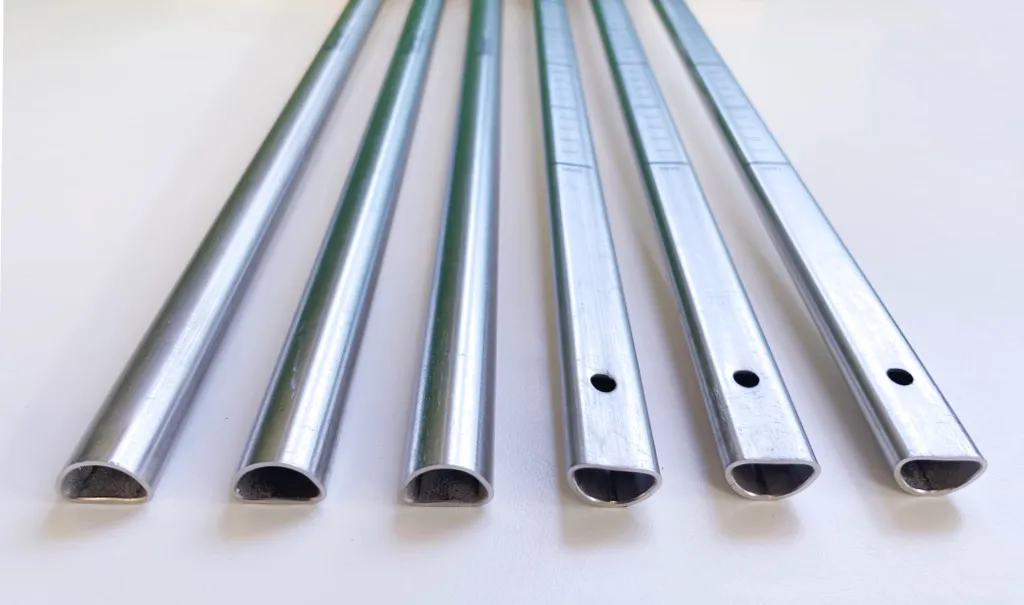 Stainless steel D-shaped tubing being used to house electronic components for a seismic measuring device
