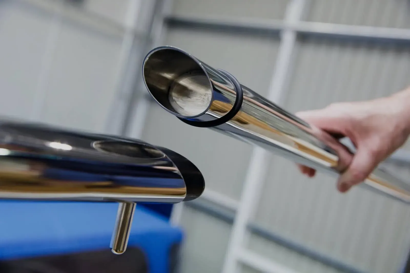 Oval stainless steel tubing being used for a marine hinged grab rail on a boat