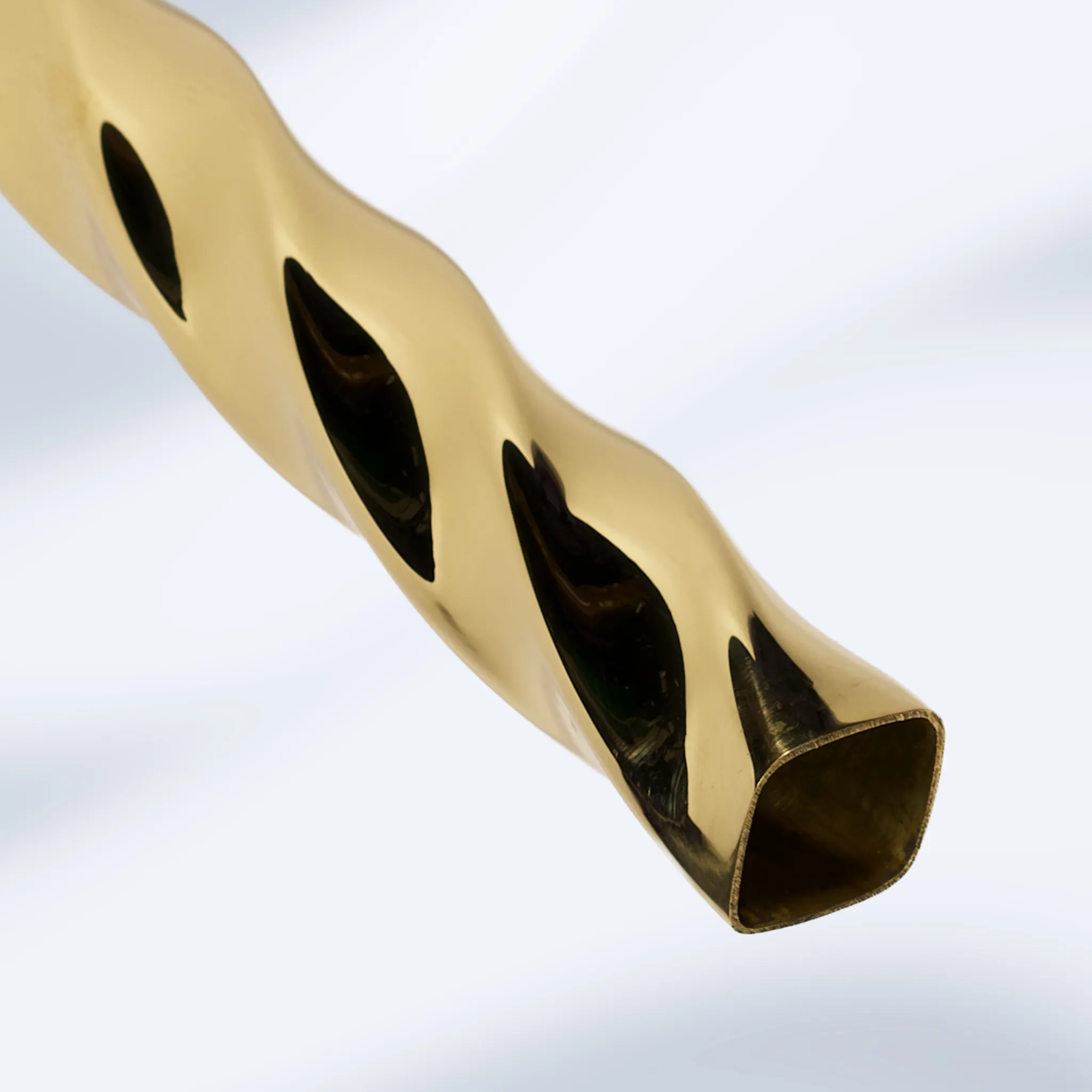 Mirror polished brass twisted square tubing